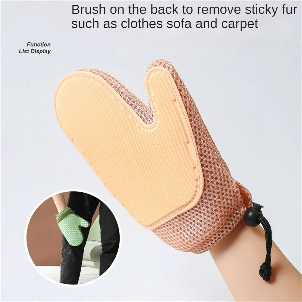 Pet hair removal glove with TPR nubs on mesh fabric, shown in dark blue, for grooming cats and dogs.