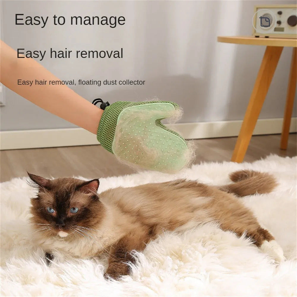 Pet hair removal glove with TPR nubs on mesh fabric, shown in dark blue, for grooming cats and dogs.