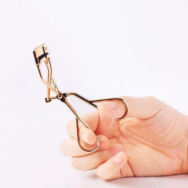 Beland eyelash curler G2 in golden colour, a manual makeup tool for curling eyelashes