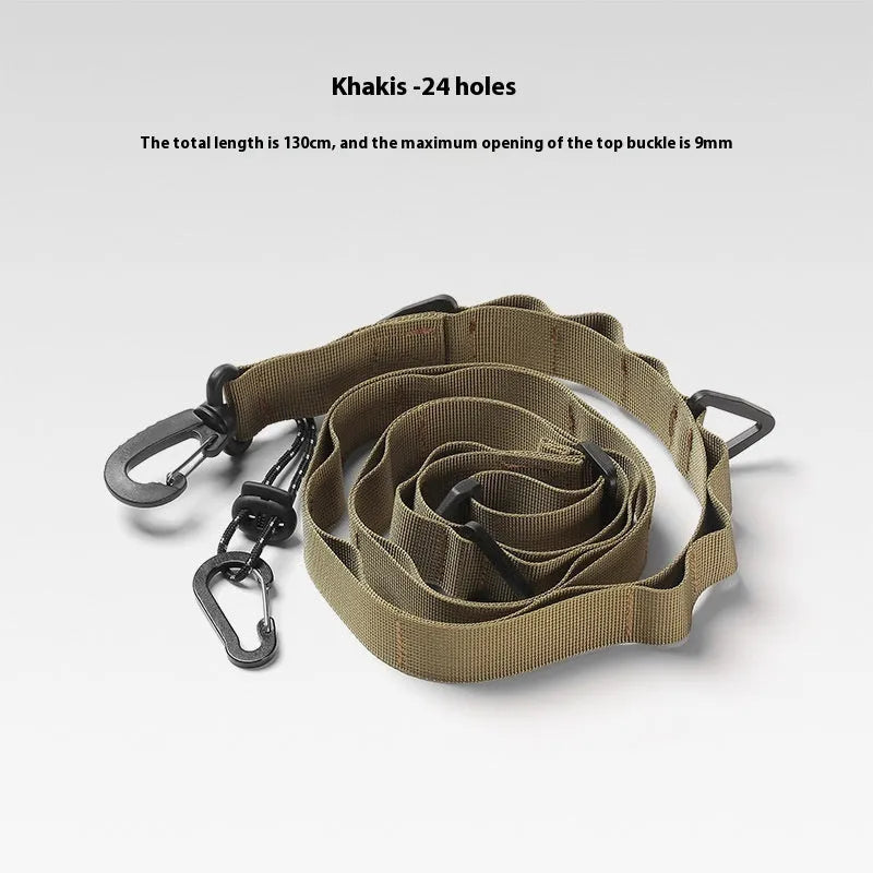 130cm black nylon outdoor hanging strap secured between two trees with laundry drying
