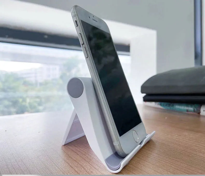Folding tablet stand with multi-angle adjustment for phones and tablets
