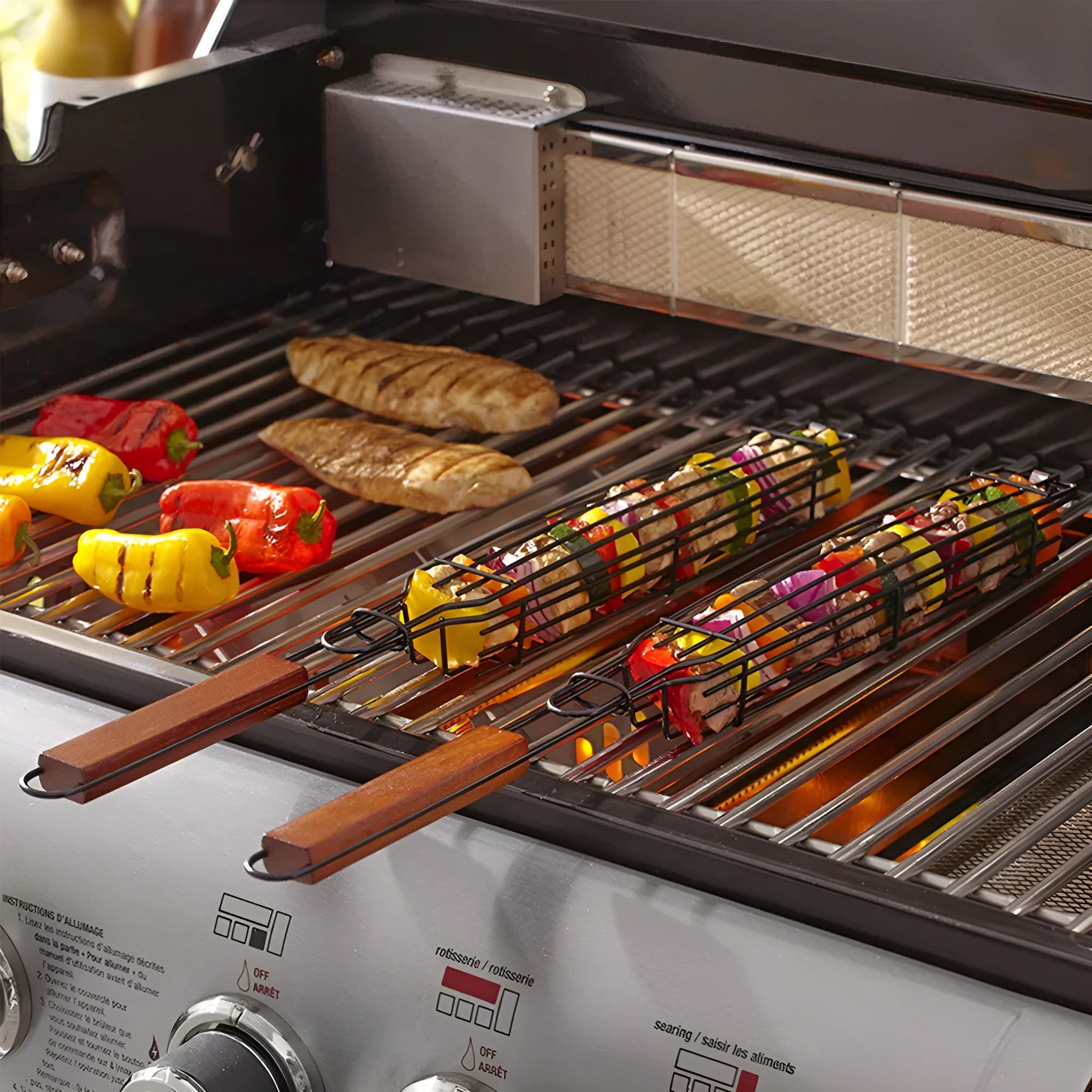 Burlywood barbecue grill mesh basket with rotary lid and long wood handle on a grill
