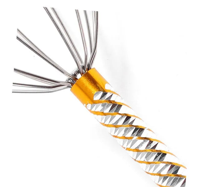 Octopus scalp massager with wooden handle and stainless steel threads on a light background