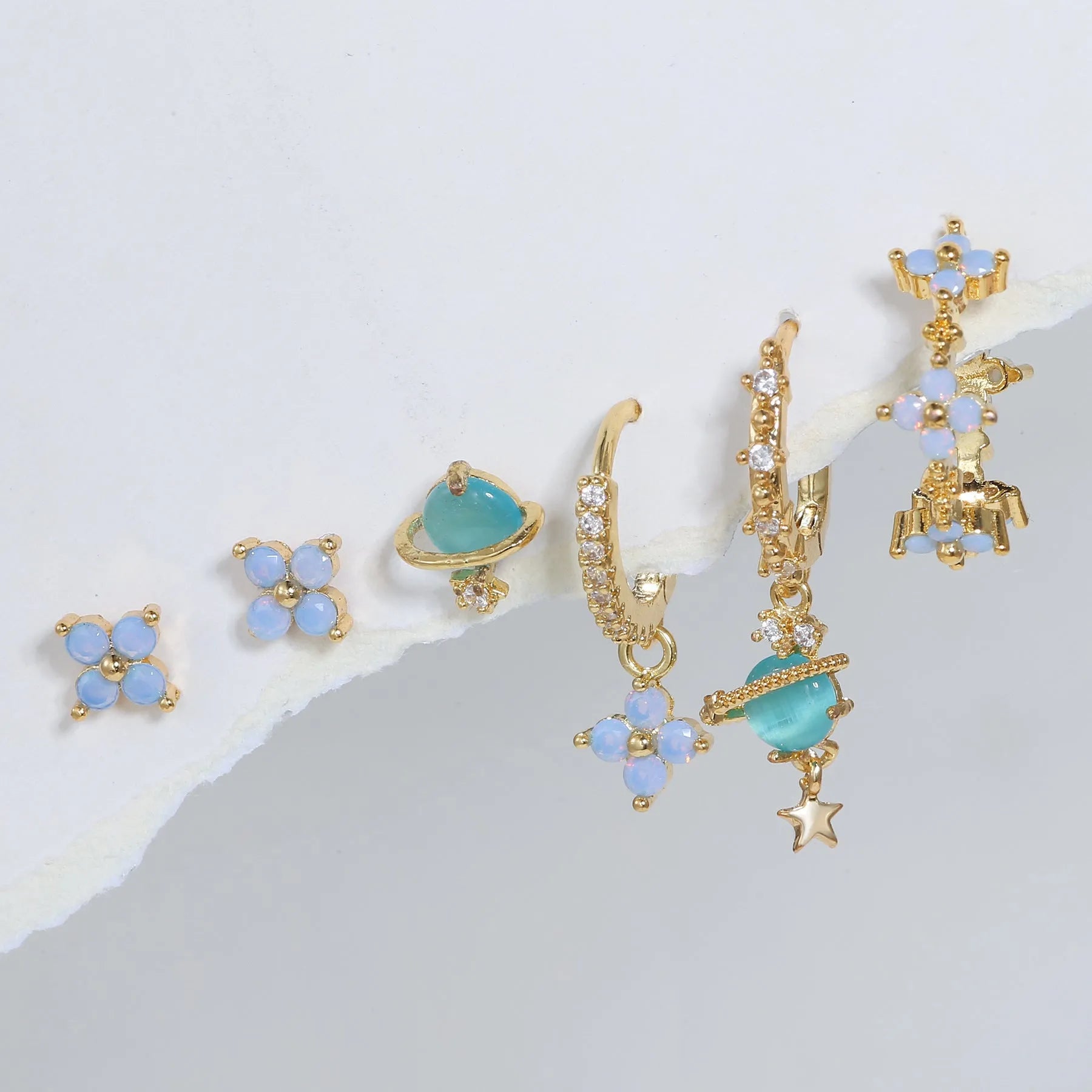 Blue zircon flower stud earrings in Japanese Korean style with gold or silver metal finish