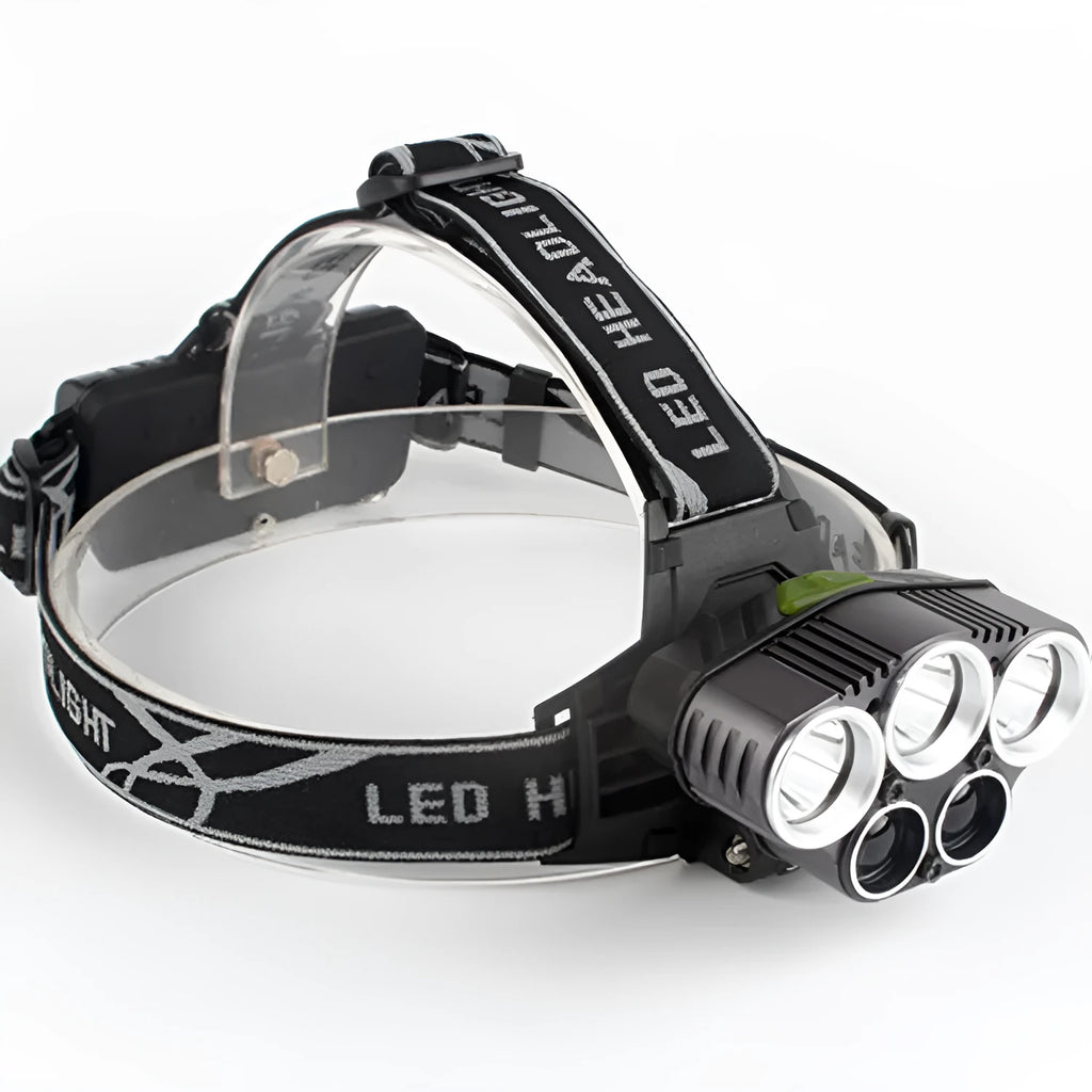 Fixed focus LED head torch with head strap, shown with its included charger.