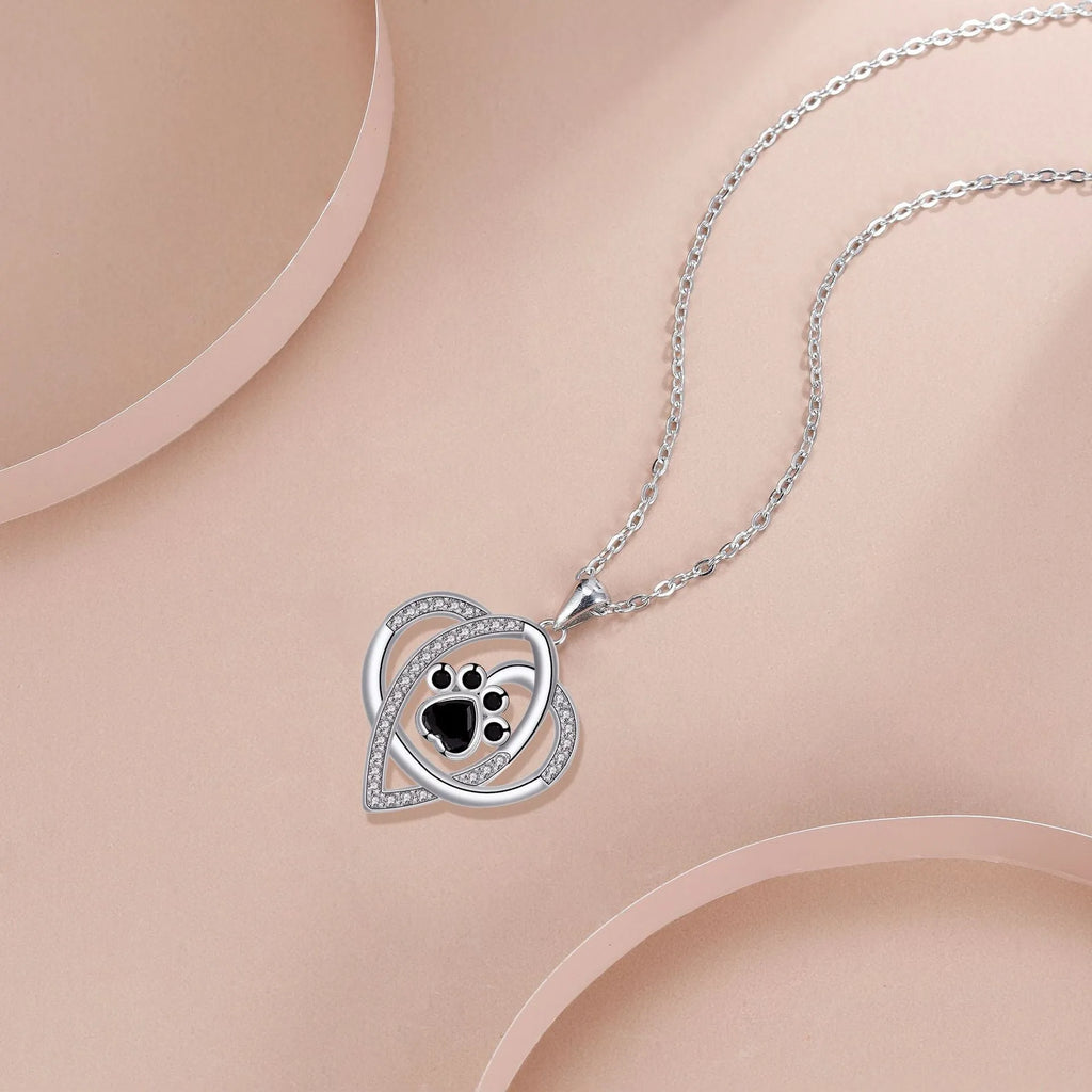 Women's necklace with dog paw footprints pendant on cross chain