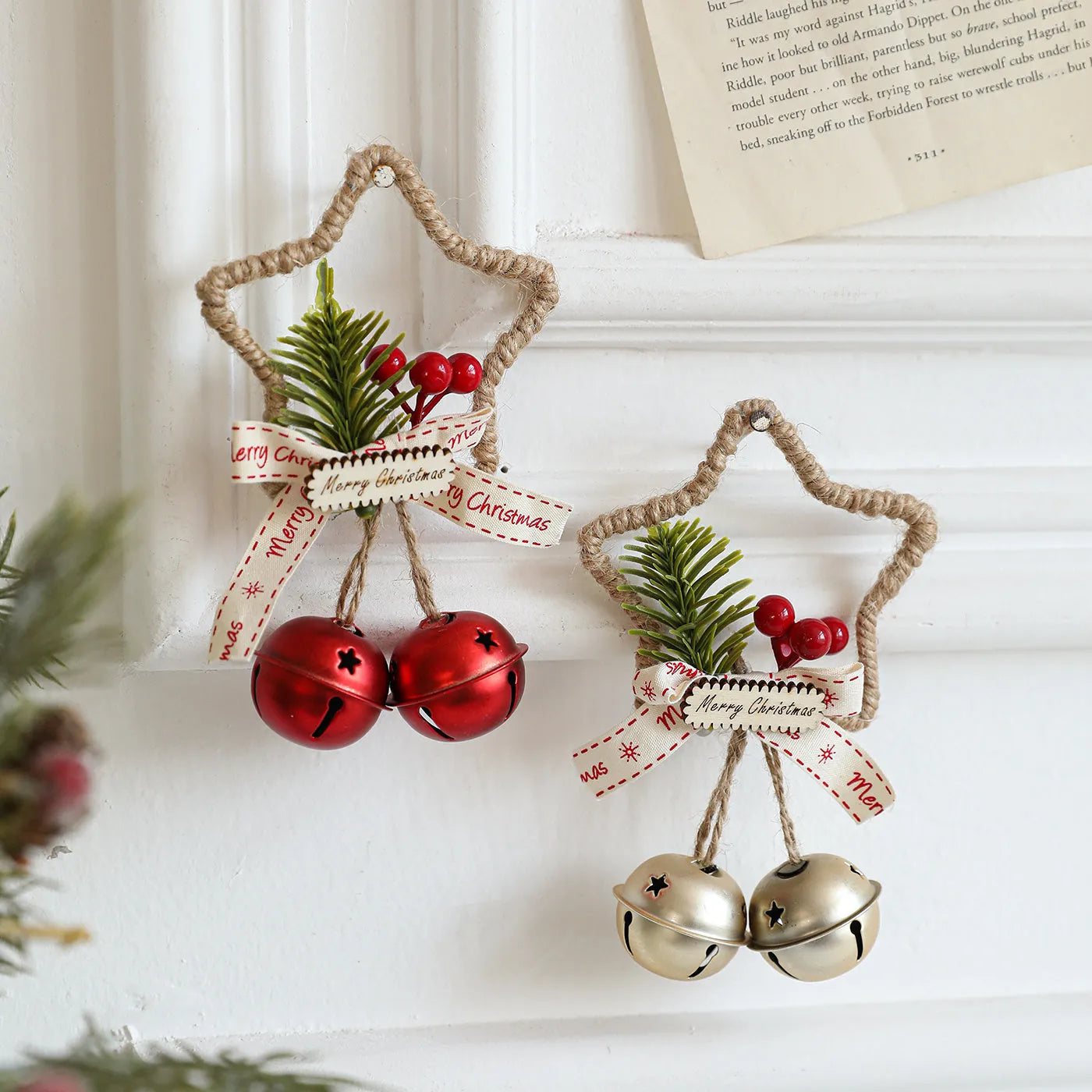 Iron Christmas bell ornament in gold on white background