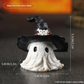 Resin wizard hat Halloween ornament in purple and black colour options.