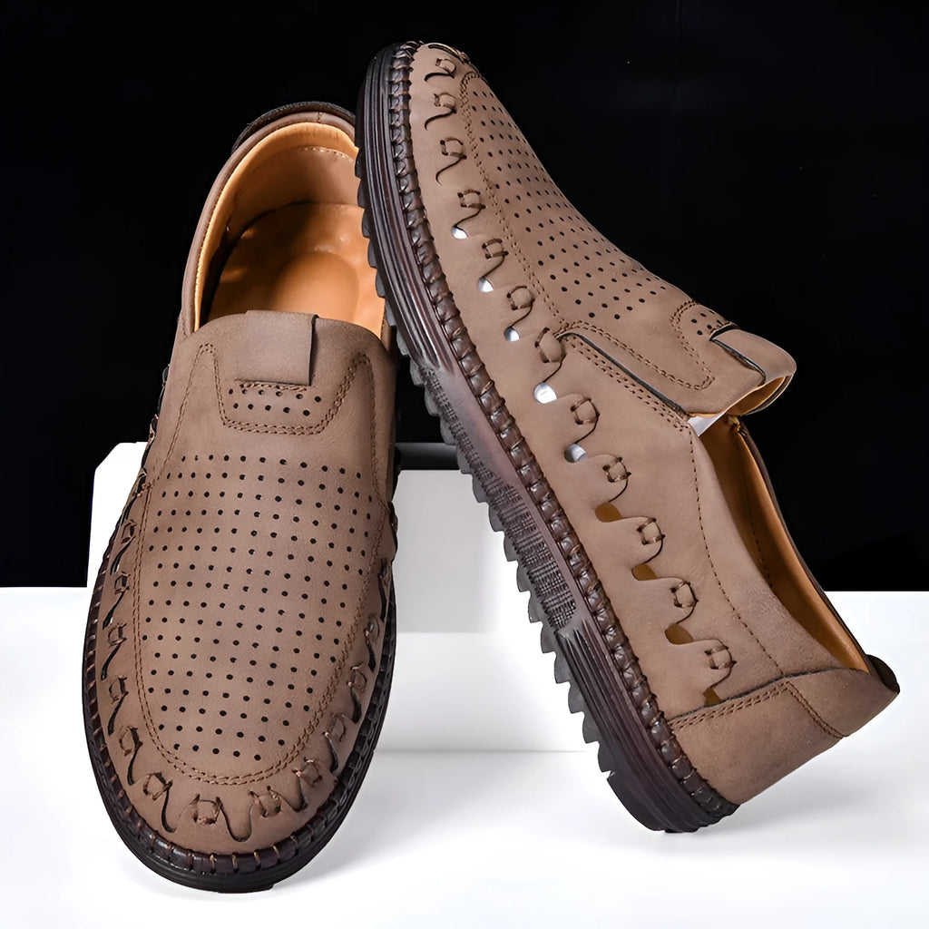 Men's brown slip-on casual shoes with round toe, low-top design, and visible sewn sole