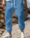 Men's straight-cut cotton summer trousers with elastic waistband in army green colour