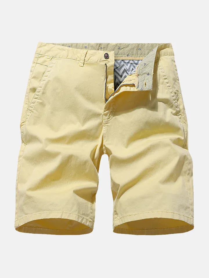 Men's loose fit printed denim casual shorts in blue, shown on a hanger.