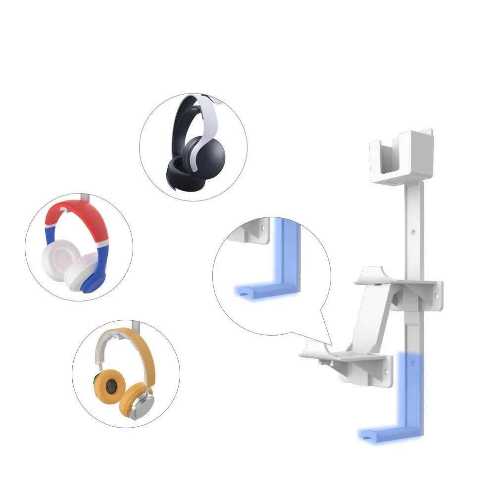 White wall-mounted plastic hook holding a black gaming controller and a headset.