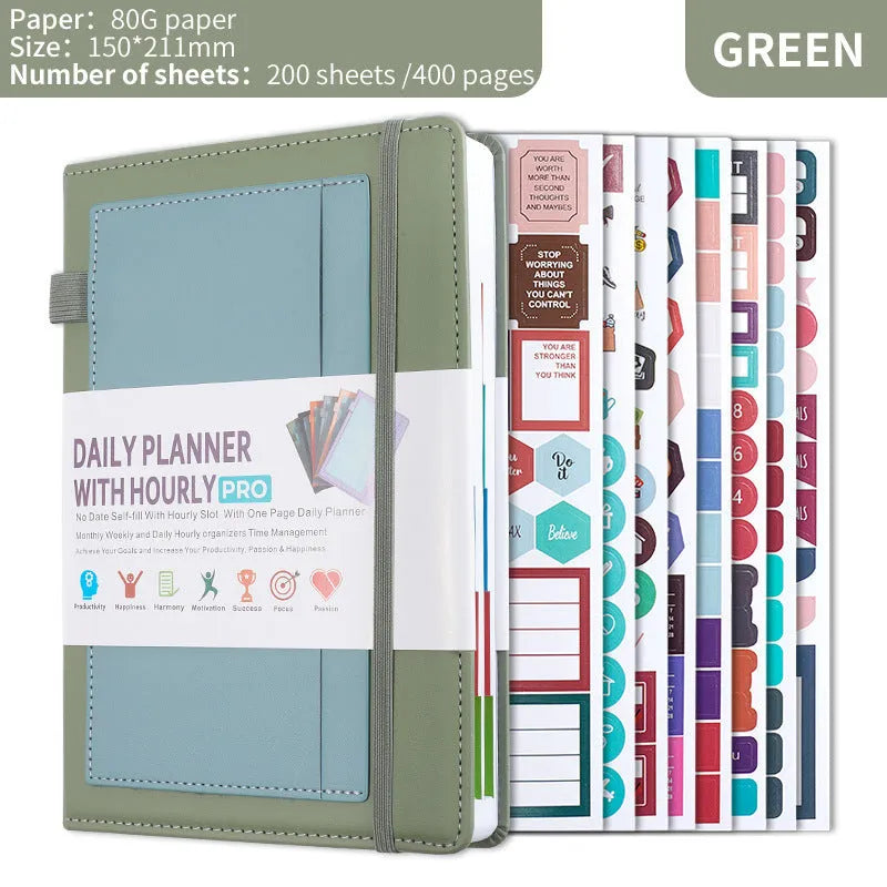 A5 undated notebook with PU leather cover in six colours, open to show flat-lay binding and planning stickers.