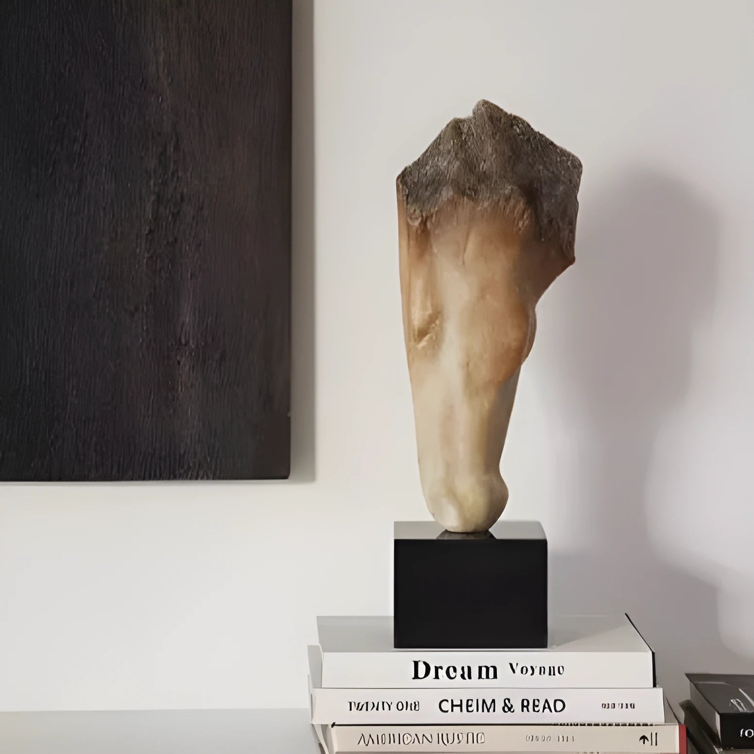 French retro style abstract horse head art sculpture ornament with carved finish on a desktop.