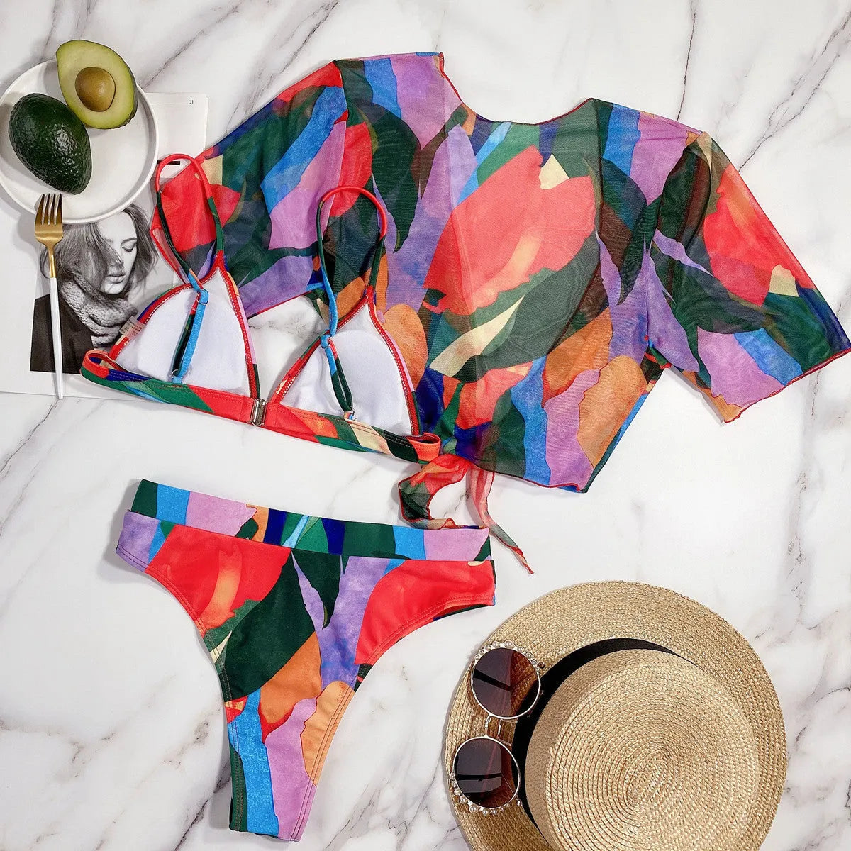 Red women's split swimsuit, a nylon bikini in a casual surfing style.
