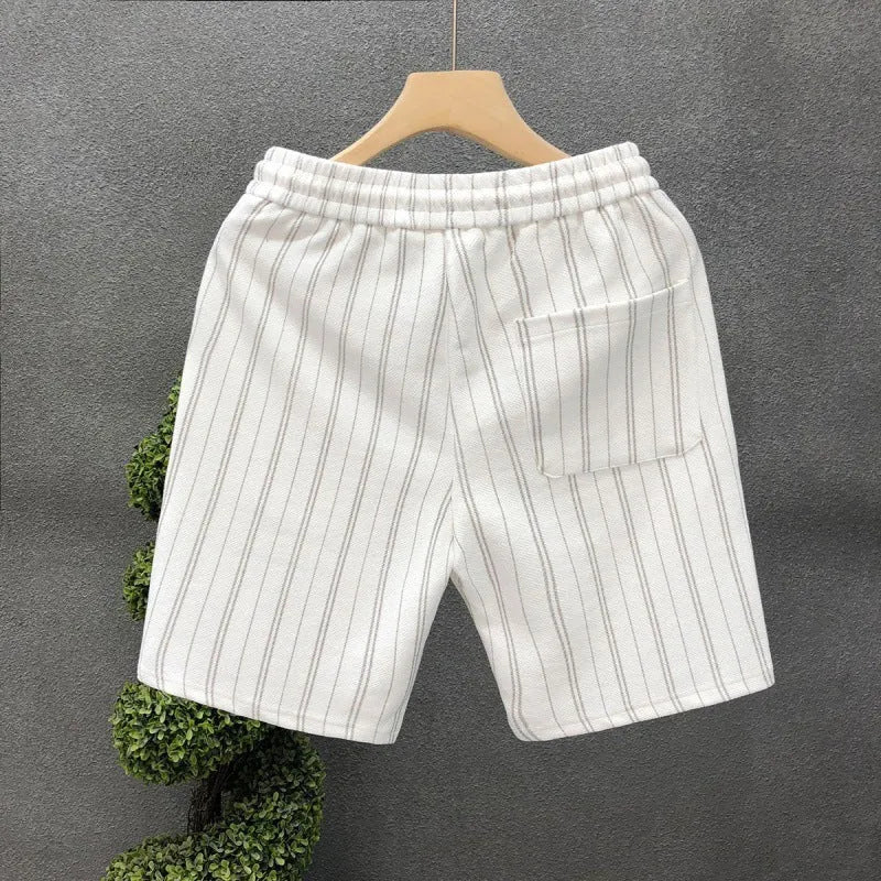 Men's black and white striped casual shorts with fleece lining and elastic waistband