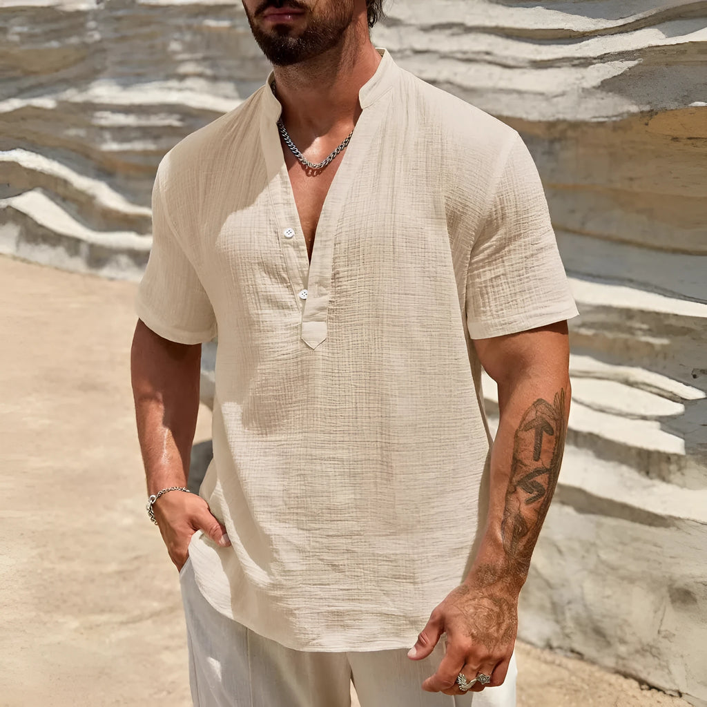 Men's solid colour short-sleeve casual shirt with a stand collar, shown in a light blue colour.