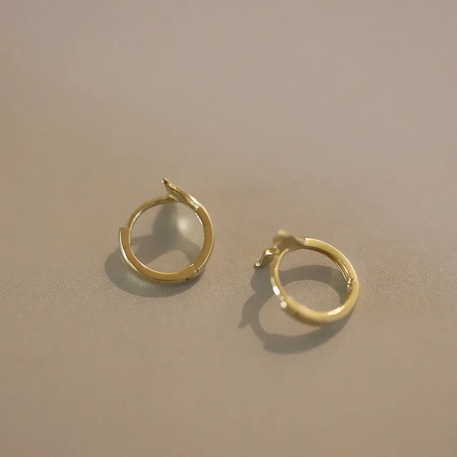 Gold plated sterling silver fishtail earrings with 8-10mm diameter hoop