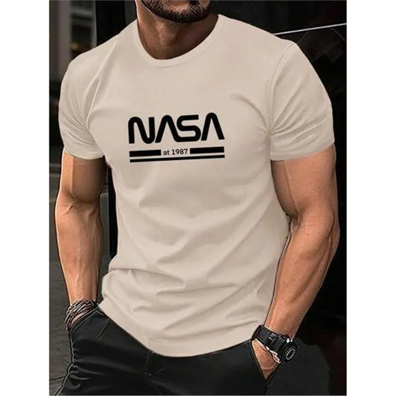 Men's slim-fit cotton t-shirt with printed letters, shown in apricot colour.