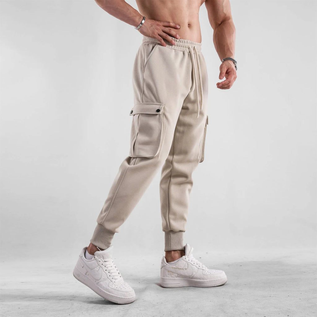 Men's loose fit cotton sports trousers with ankle tie detail and multiple pockets in various colour options