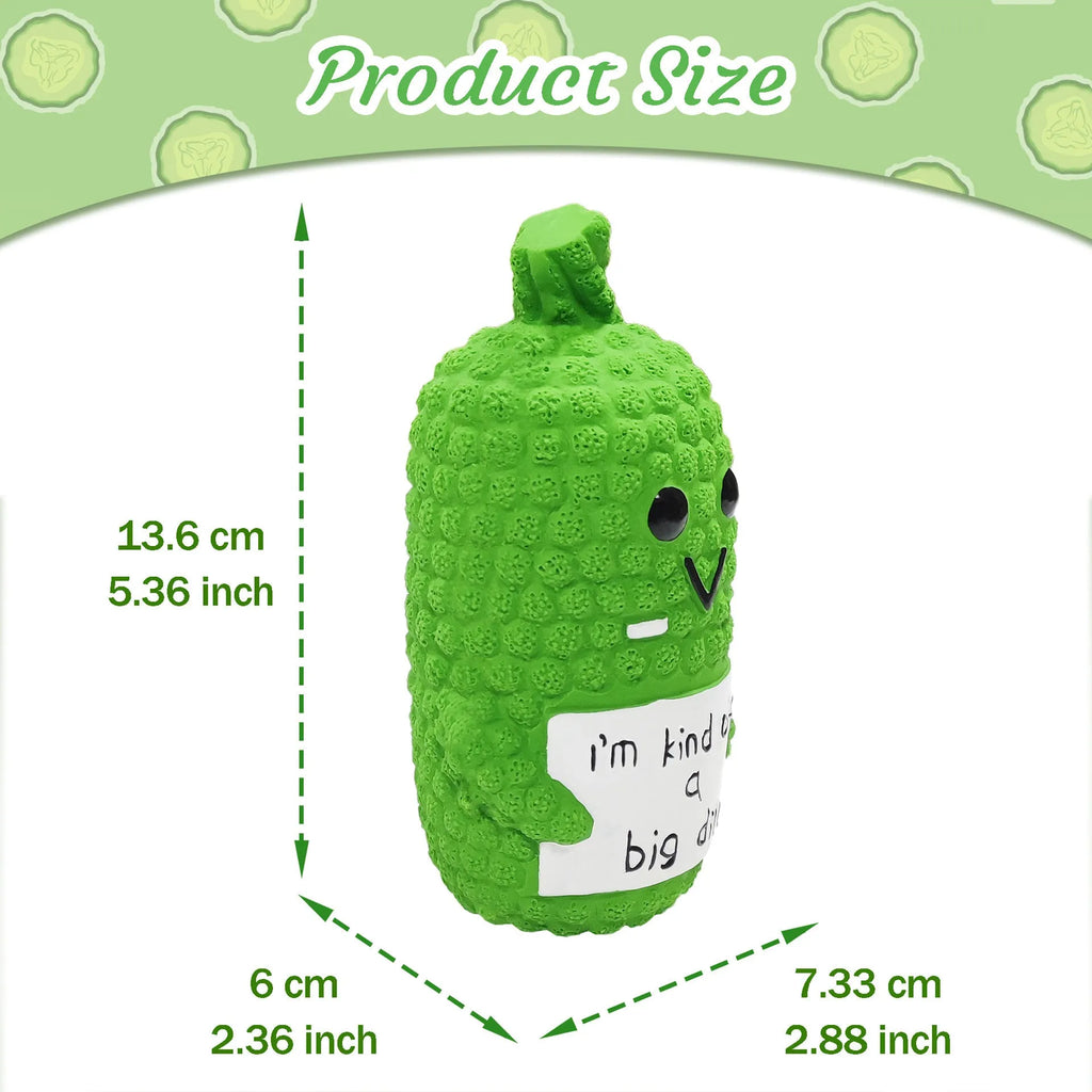 Green pickle-shaped latex dog chew toy with textured surface and squeaker