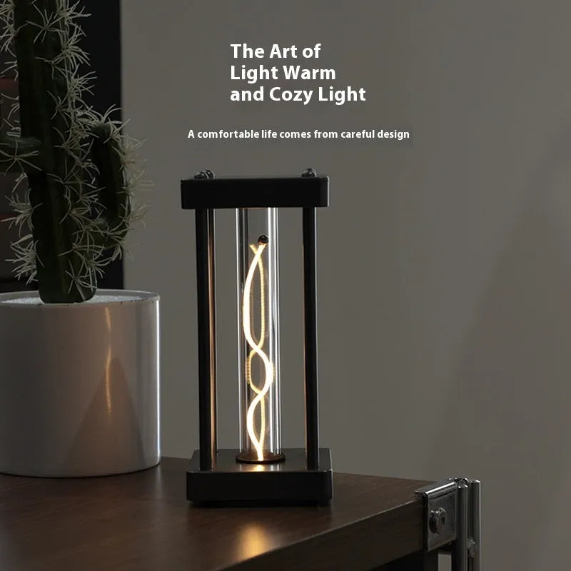 Metallic gray USB rechargeable night light with curved wire, 68x68x159mm