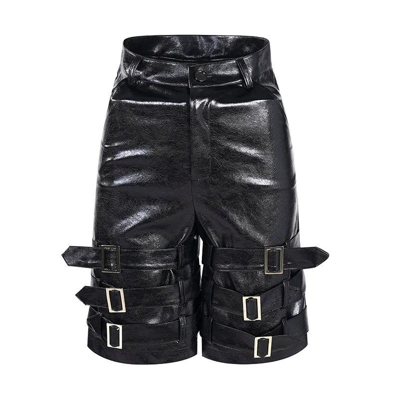 Black men's PU leather cropped shorts on a model, showing medium low waist and casual fit.