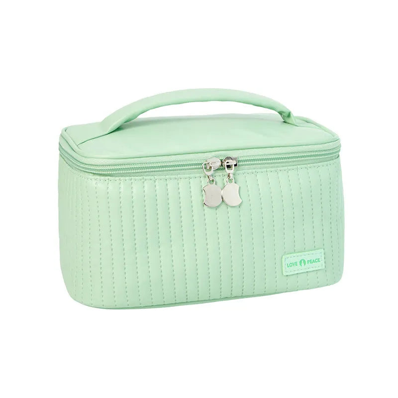 Open-top PU leather makeup bag with zip closure in a choice of six colours.