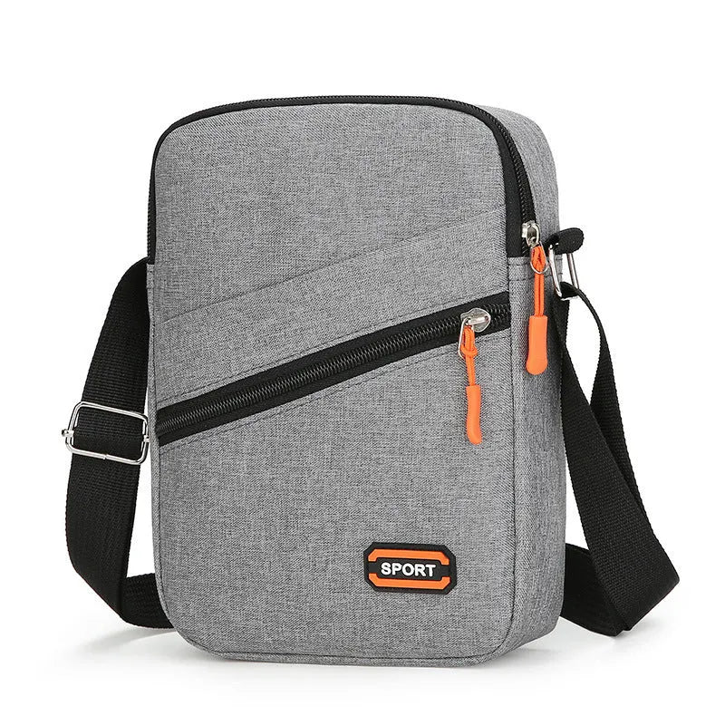 Oxford cloth commuter crossbody bag in silver grey, black or navy blue with contrast colour details