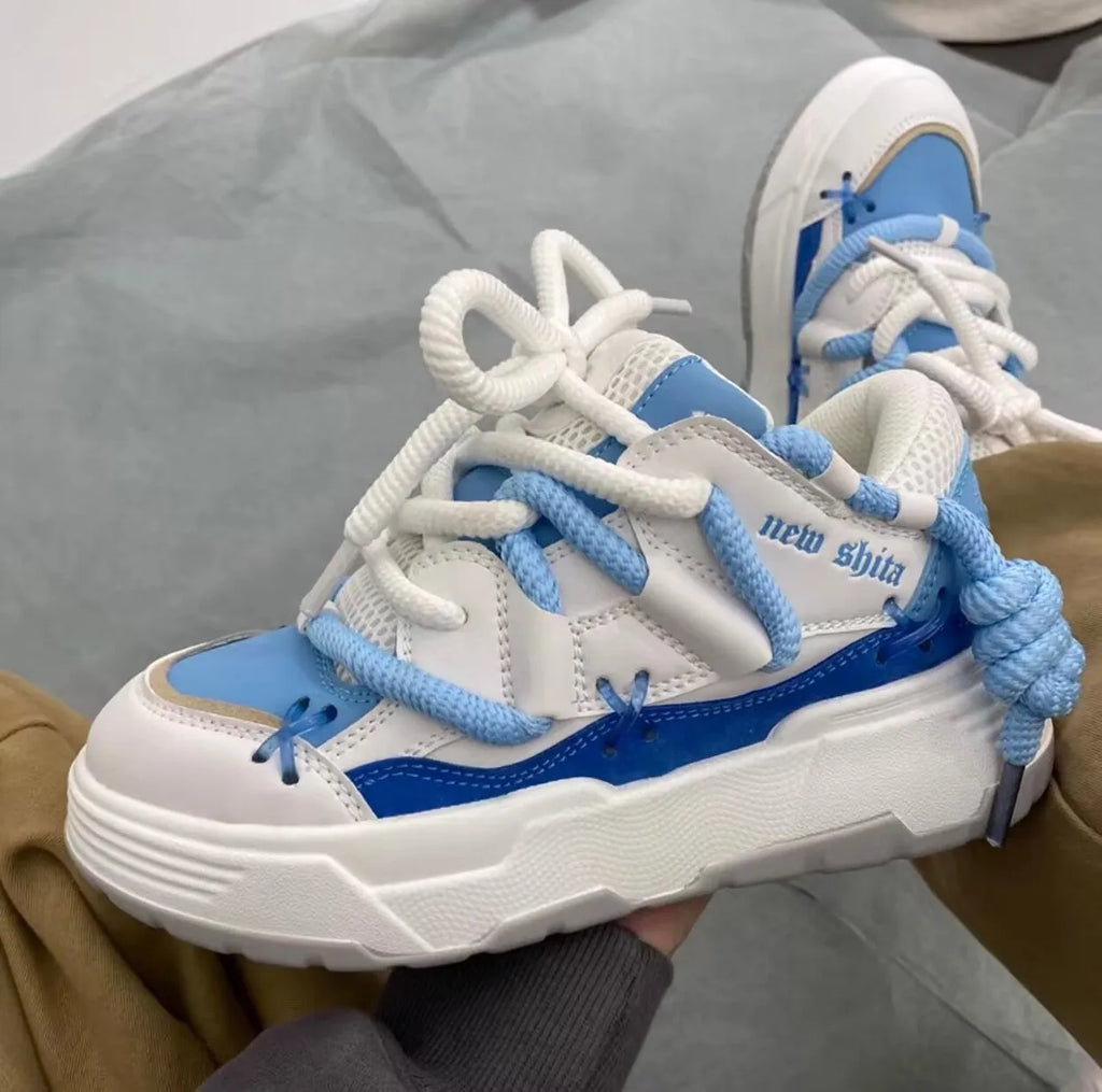 Women's grey retro chunky sneakers with thick rubber sole and lace-up front
