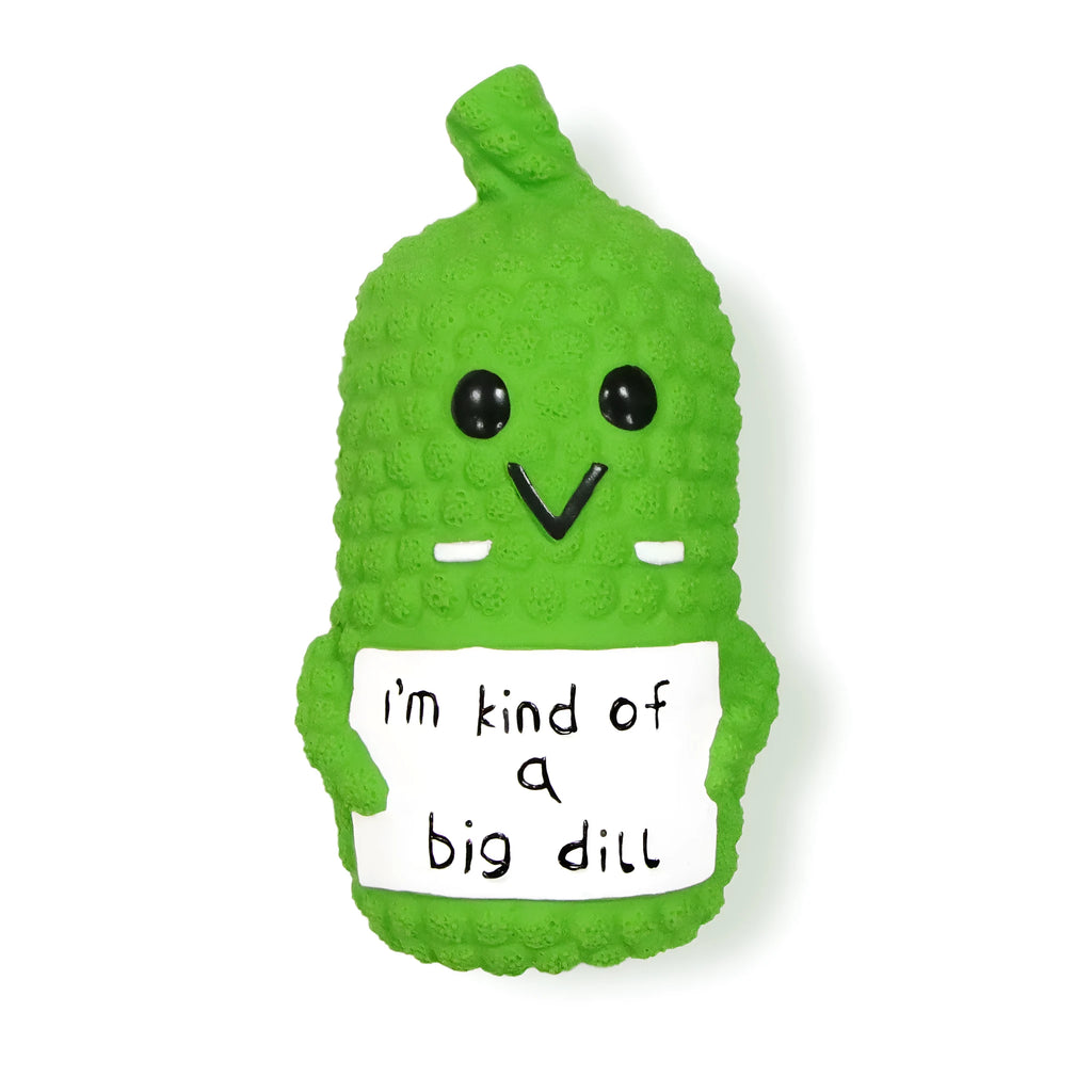 Green pickle-shaped latex dog chew toy with textured surface and squeaker