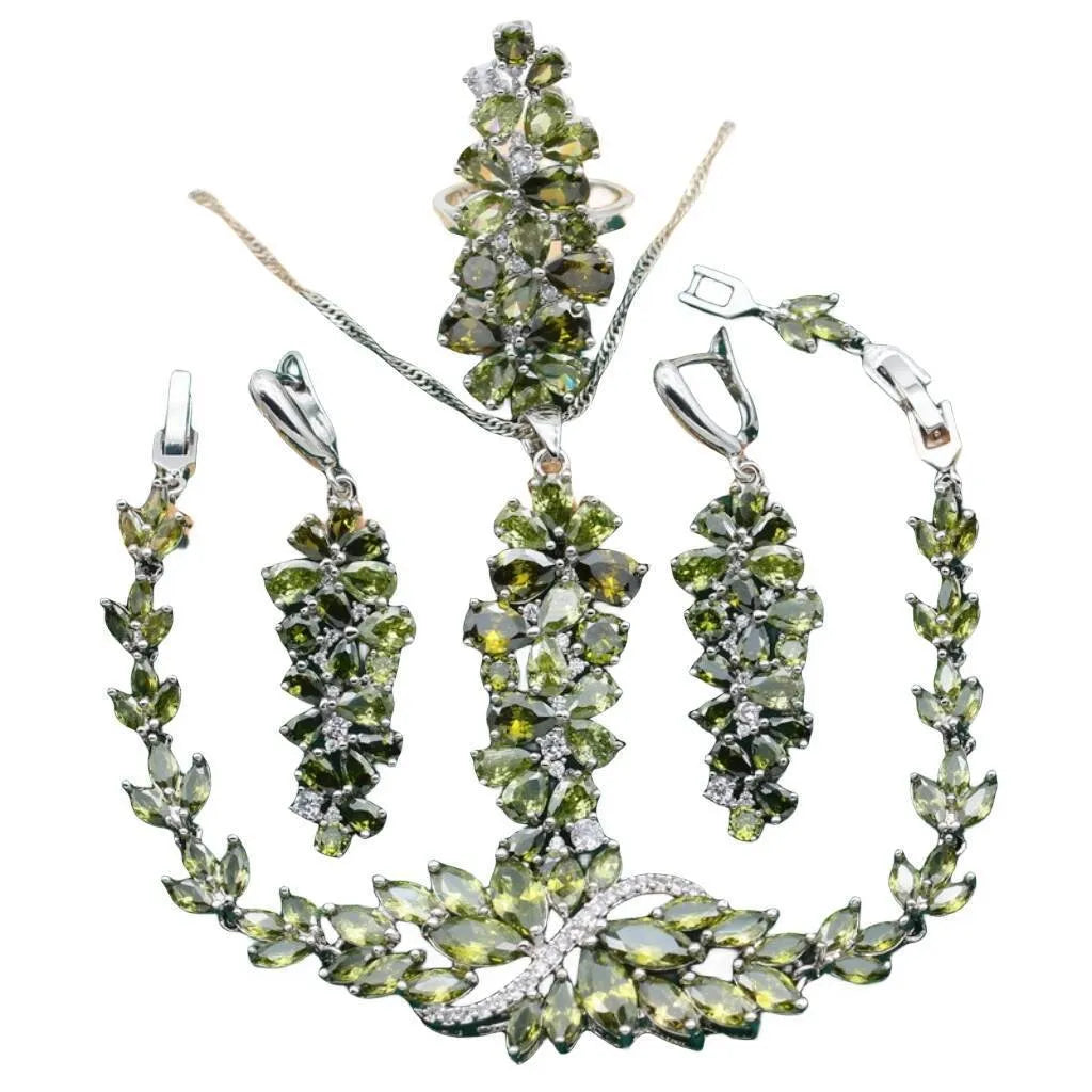 Retro jewellery set with plant pattern designs showing necklace, bracelet, earrings and ring pieces