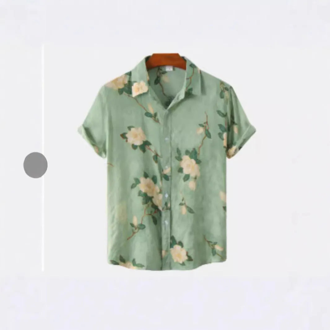 Man wearing a short sleeve Hawaiian shirt with a blue and white floral digital print and a lapel collar.