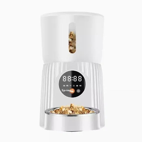 Automatic pet feeder with timer display and food storage compartment in black colour