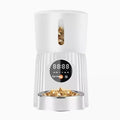 Automatic pet feeder with timer display and food storage compartment in black colour