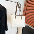 Korean style black PU shoulder underarm bag with a sandwich pocket and horizontal square shape.