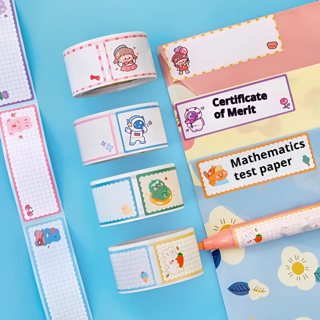 Roll of colourful cartoon name tape stickers with dinosaur, astronaut, rabbit, and girl designs.
