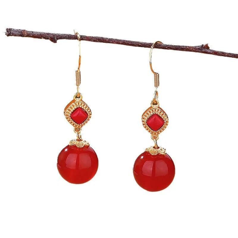 Geometric copper alloy earrings with round Southern red agate beads set in S925 silver.