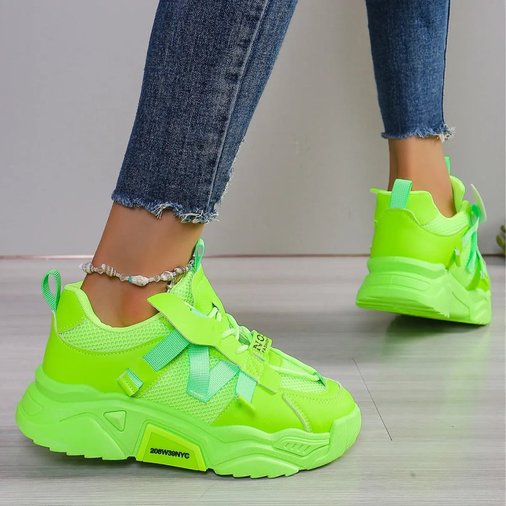 Women's platform mesh sports shoes in animal pattern design showing height increase sole and front lace-up closure