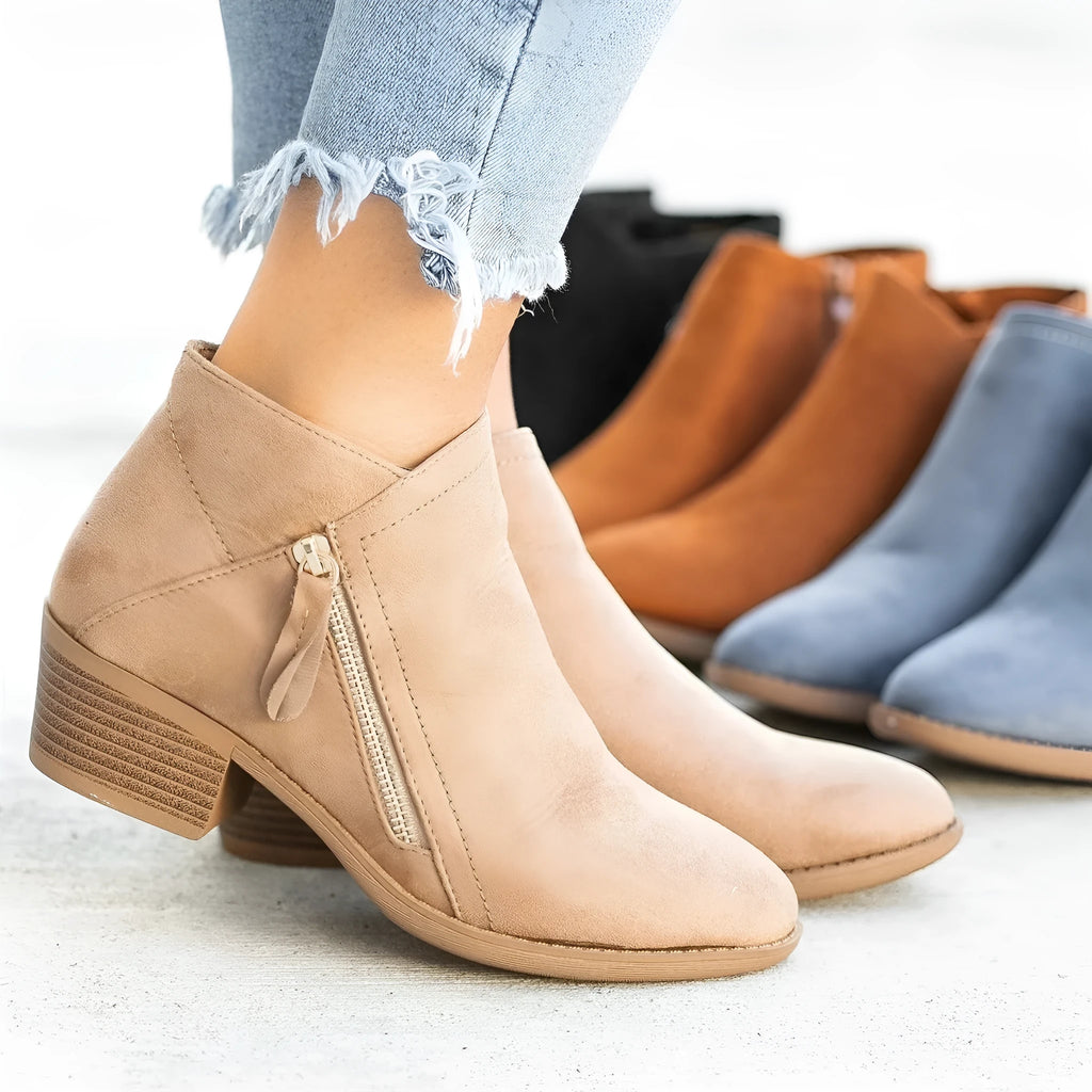 Women's suede Dr. Martens ankle boots with a side zip and chunky heel in beige colour