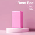 Solid colour EVA foam yoga block with hexagonal ridges, shown next to tape measure showing 23cm length