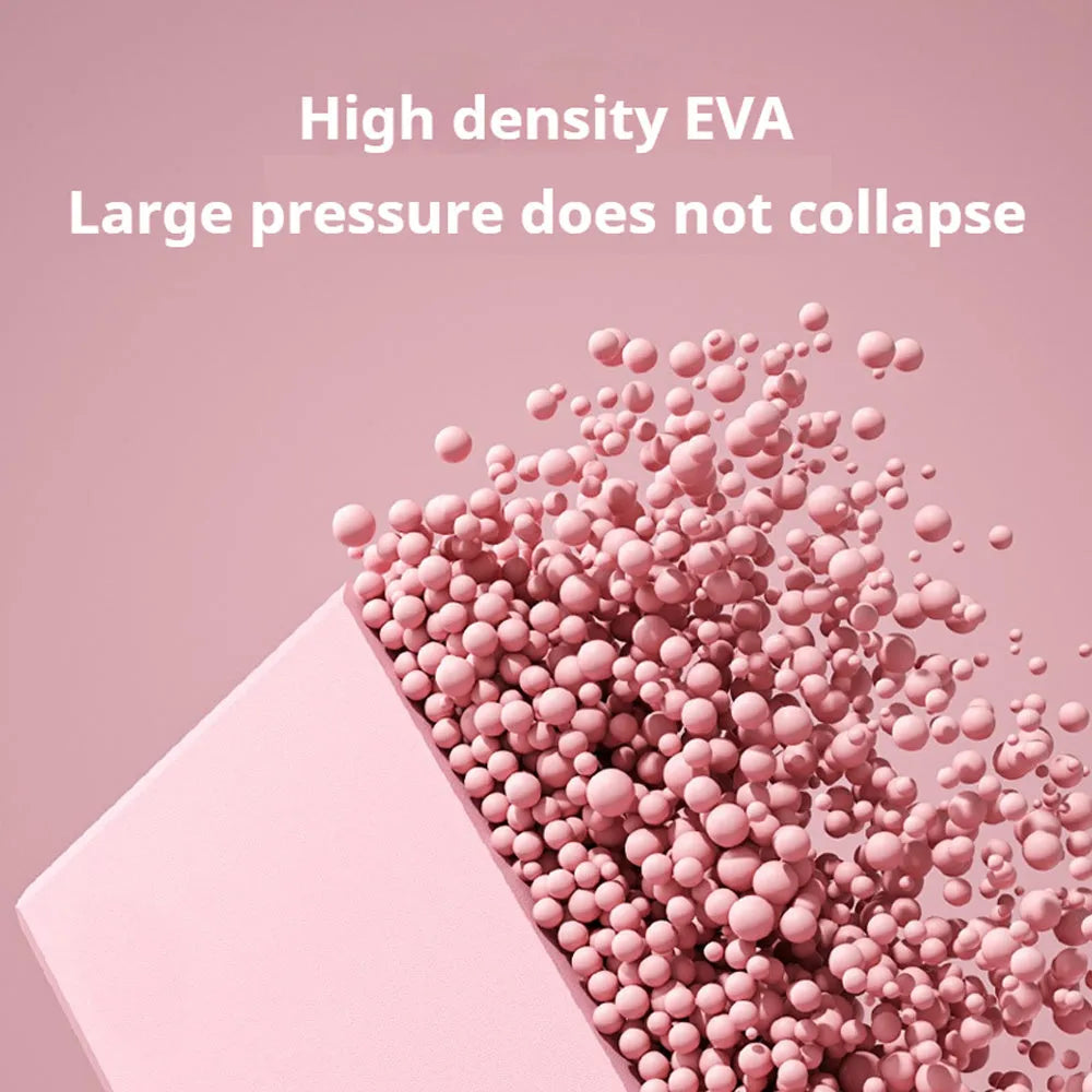 Solid colour EVA foam yoga block with hexagonal ridges, shown next to tape measure showing 23cm length