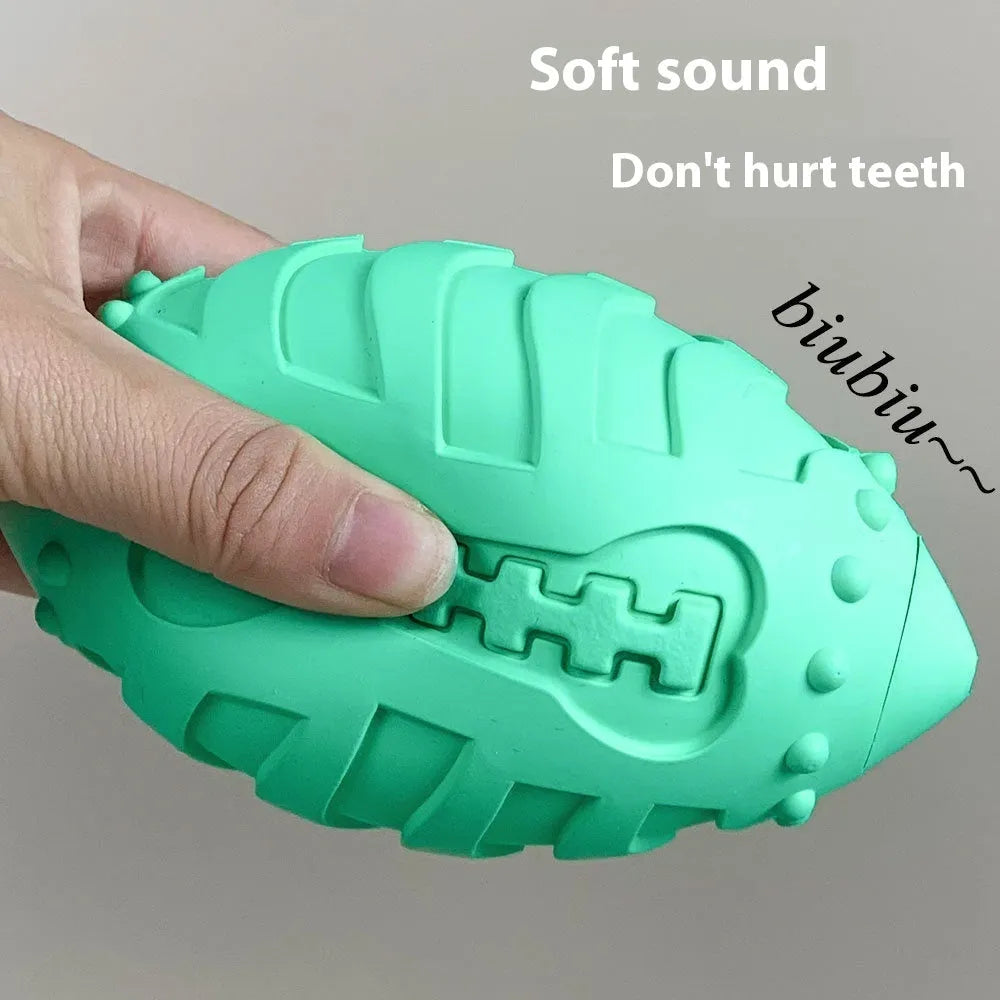 Thickened rubber dog training rugby ball in sapphire blue with vocal squeaker for teeth cleaning