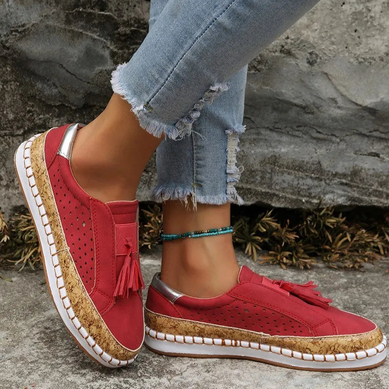 Women's casual tassel loafers with low heel, patent leather finish, round toe, and slip-on style in multiple colours