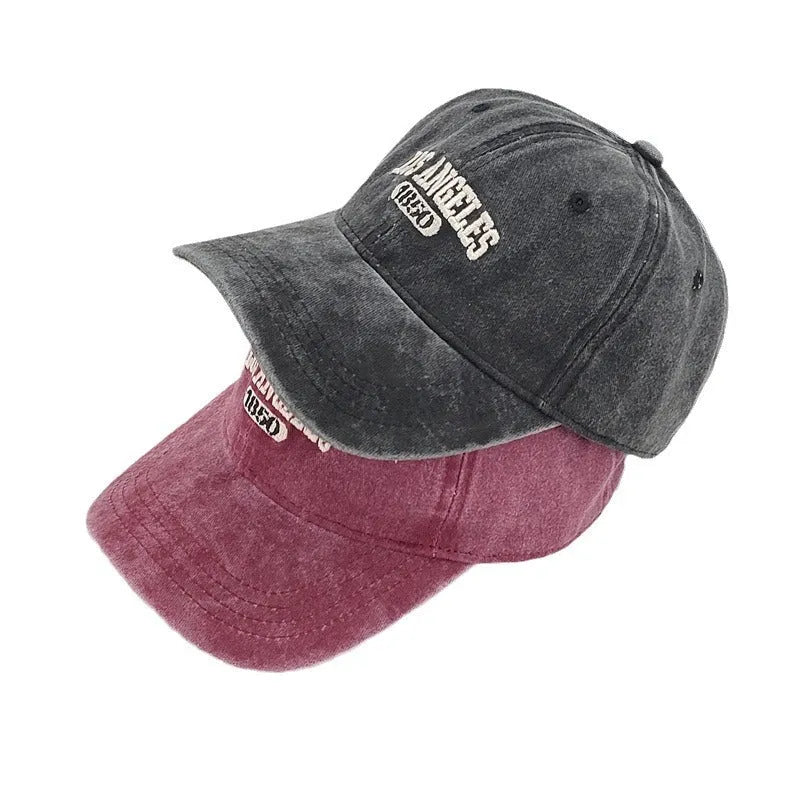 Personalised adult peaked cap with distressed letters embroidery in adjustable sizing
