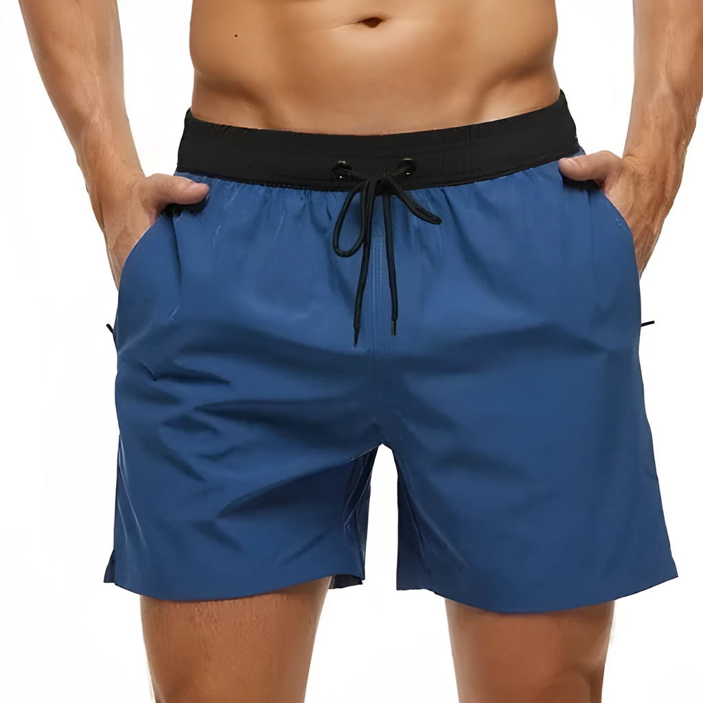 Men's blue stitching waist running shorts with a zippered pocket and drawstring.