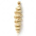 Golden synthetic wig on a stand showing long, straight high-temperature chemical fibre weft.