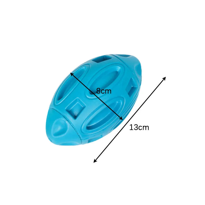Blue, green, and orange natural rubber squeaky dog ball with textured surface grooves.