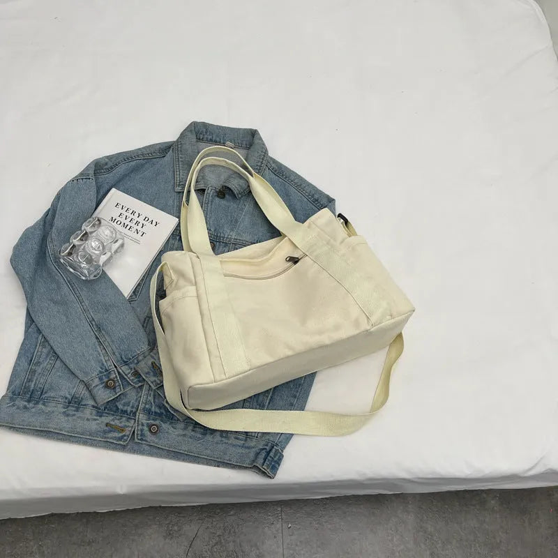 Large capacity polyester shoulder tote bag for women in solid colours with mobile phone pocket