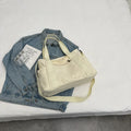 Large capacity polyester shoulder tote bag for women in solid colours with mobile phone pocket